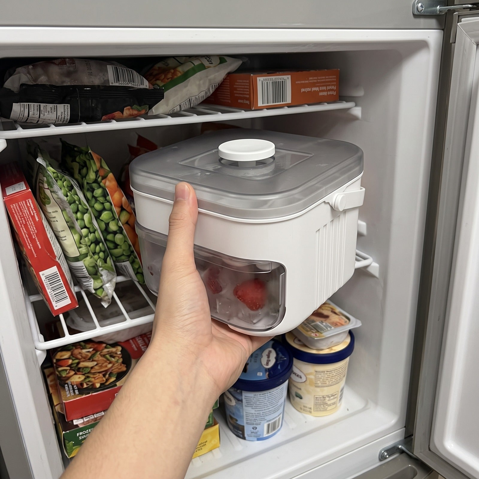 White Coldpour being placed on a freezer shelf